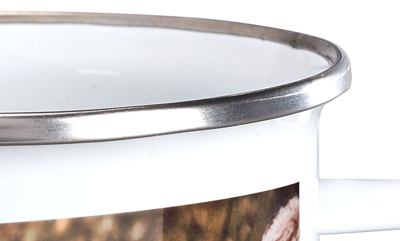 A beautiful white cup with a silver rim, designed with a warm photo motif.