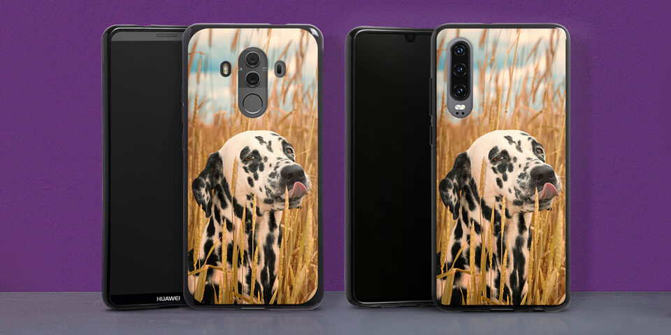 Two phone cases featuring a Dalmatian in the grass