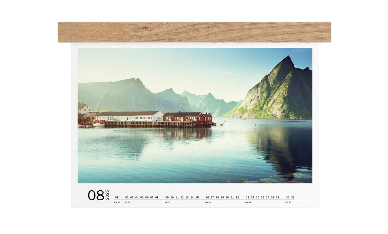 A beautiful calendar shows an idyllic landscape with mountains and calm water in the background. Month August is visible.