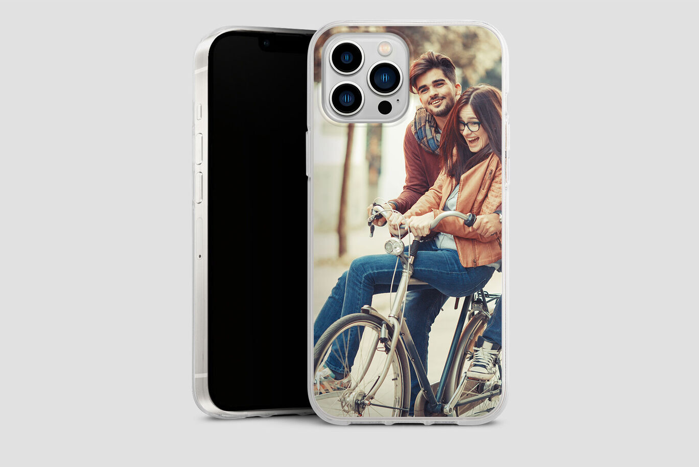 Two people on a bicycle, with a smartphone background and phone case.