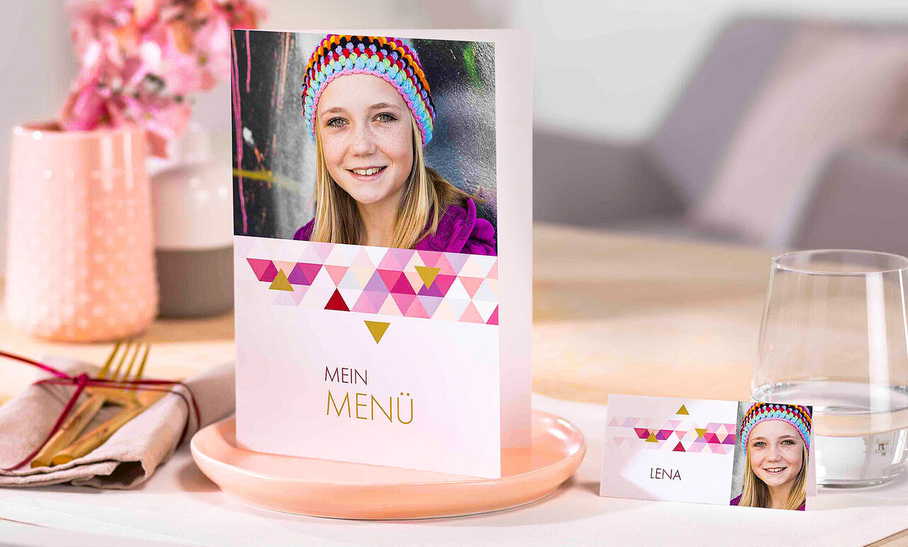 Colored menu card with geometric patterns and names.