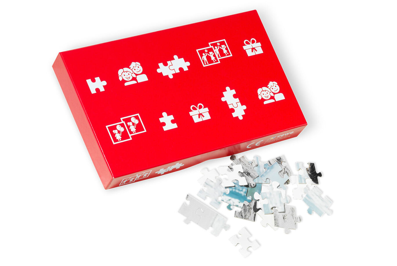 Colorful puzzle box with pieces in different shapes.