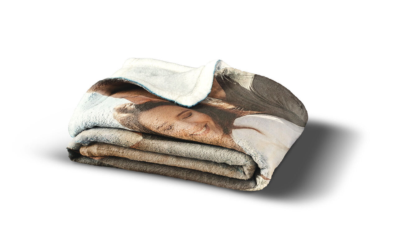 Wrinkled blanket featuring a happy photo of friends