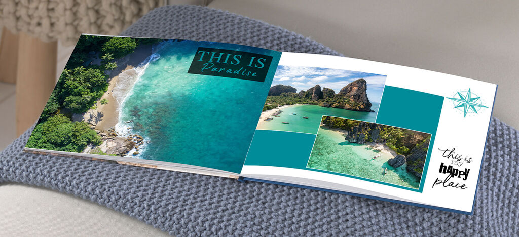 A beautiful photo book featuring a holiday view of the beach and green trees.