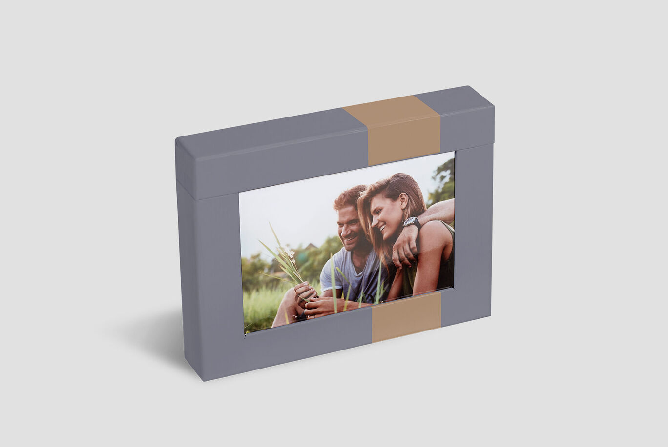 Beautiful gift box with a photo of a couple enjoying nature together.