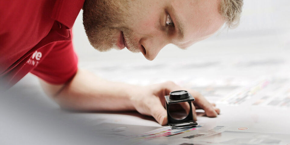 A creative employee inspires ideas during photo editing.