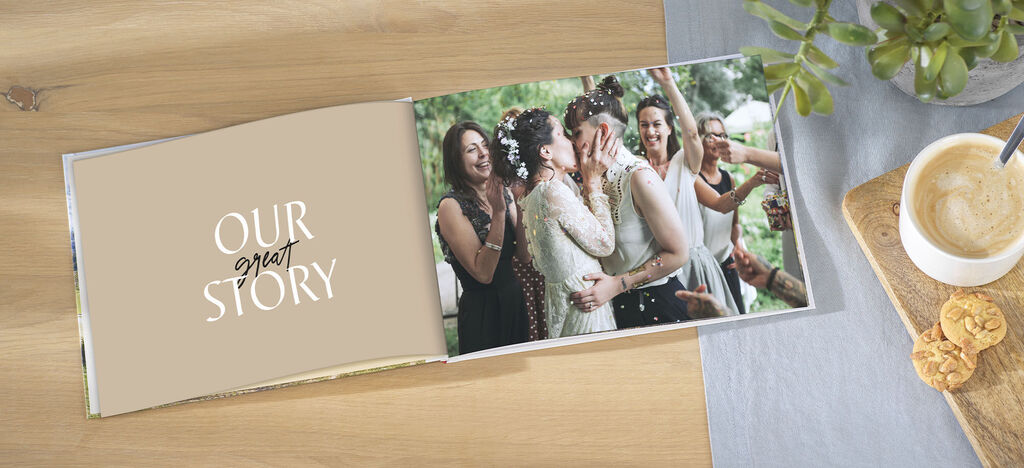 Bride and friends celebrate joy in a photo book.