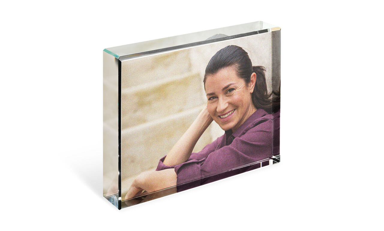 An elegant photograph in a clear acrylic block showing a moment of relaxation