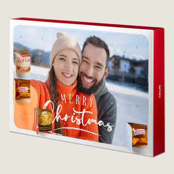 A beautiful red and white advent calendar with Christmas sweets, decorated with "Merry Christmas"
