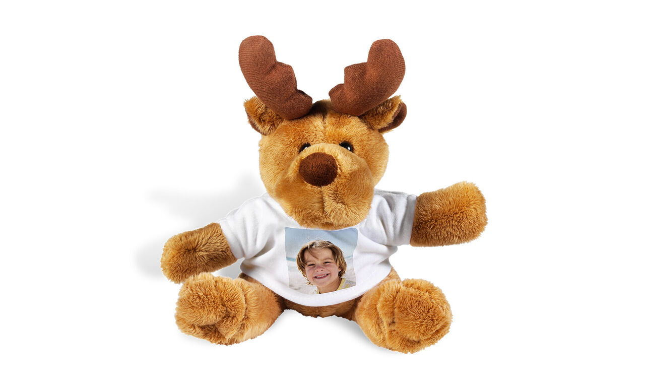 A cute plush reindeer with a white T-shirt.