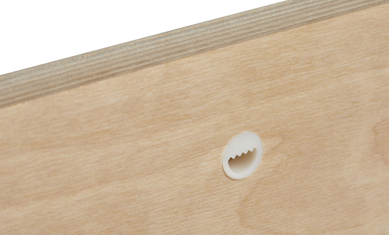 Background with wood texture, a hole for wall mounting visible