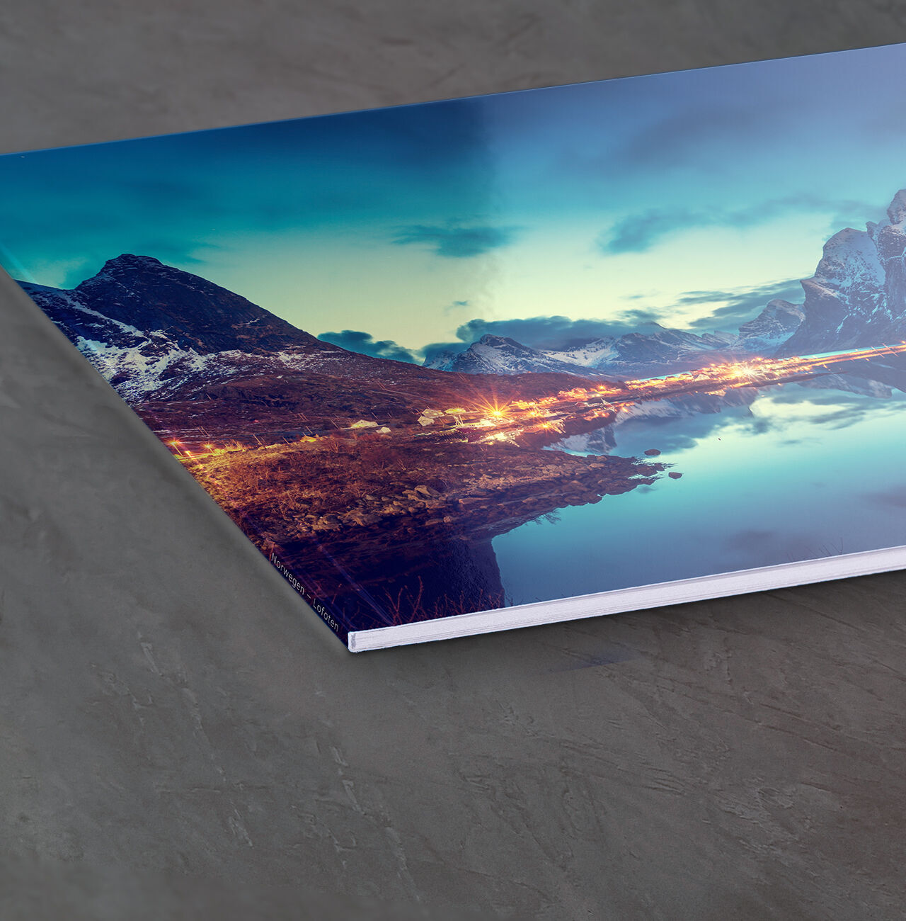 A beautiful wall picture of a sparkling lake with snow-capped mountains in the background