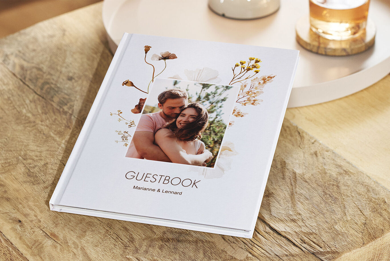 A lovingly designed guest book with floral design and space for personal entries.