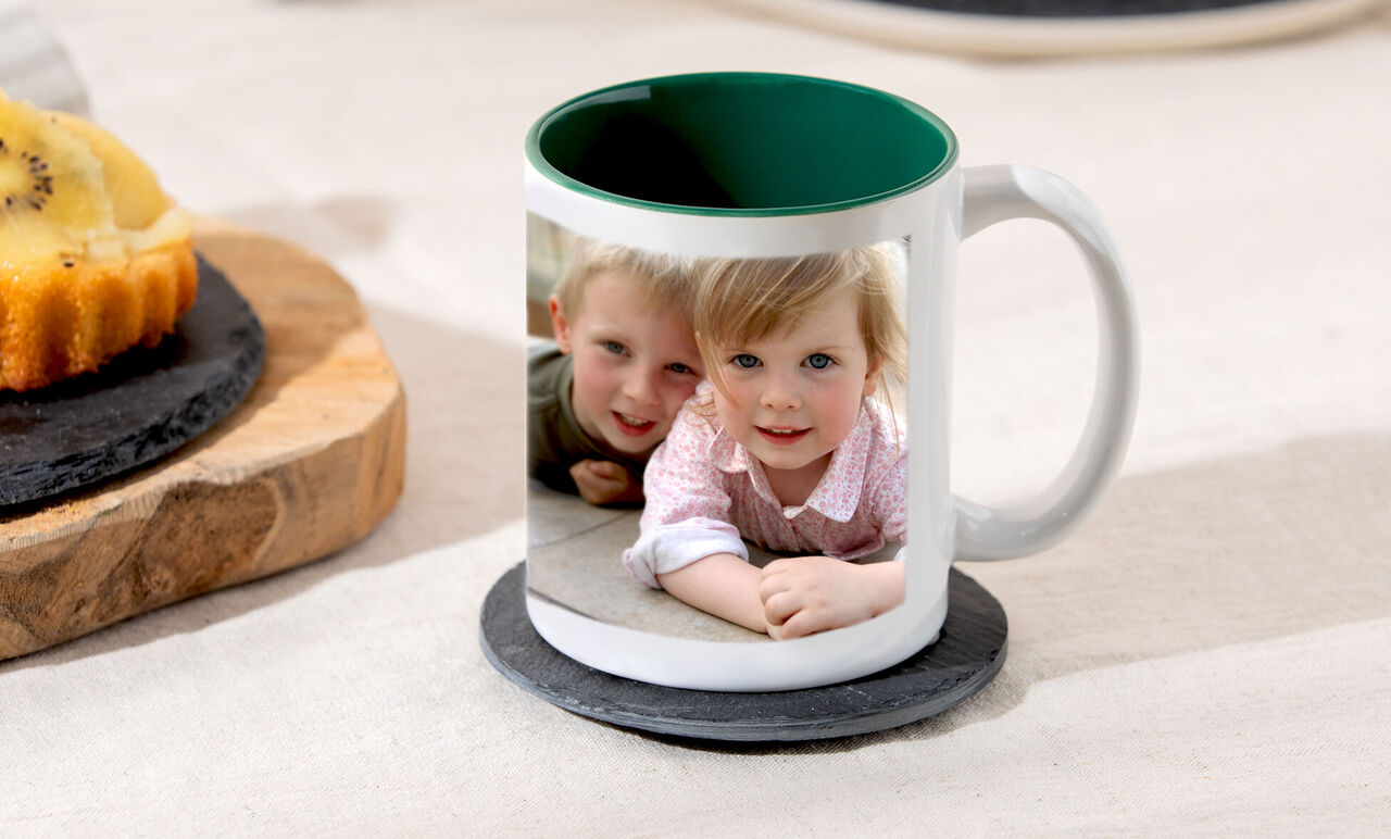 Cup with colorful rim and a personal photo.