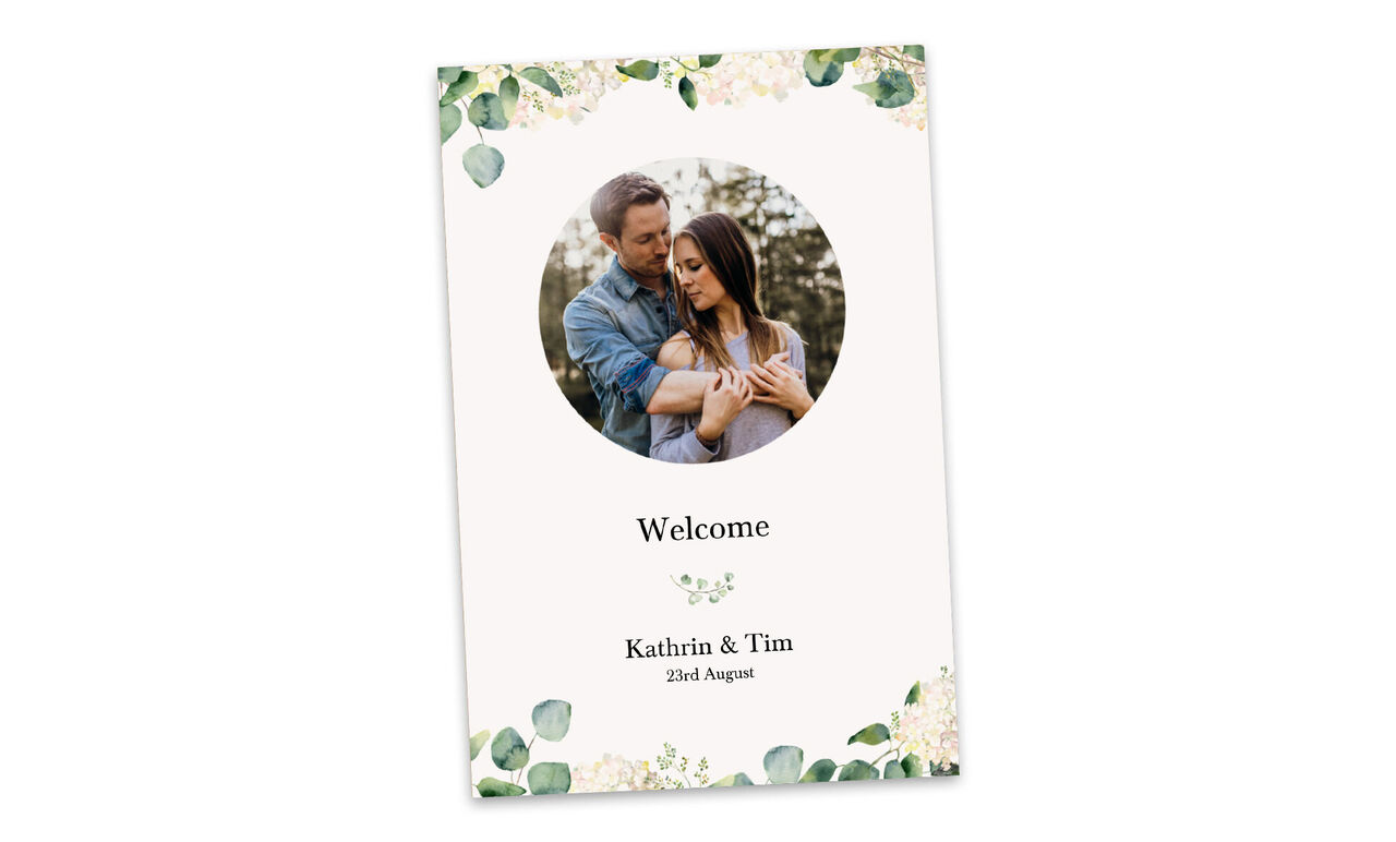 A beautifully designed welcome card for Katharina and Tim with floral elements and a warm welcome.