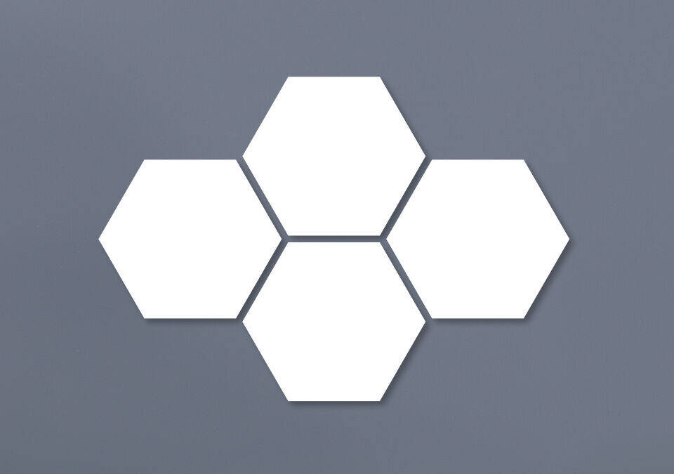 Empty hexagonal shapes on a gray background.