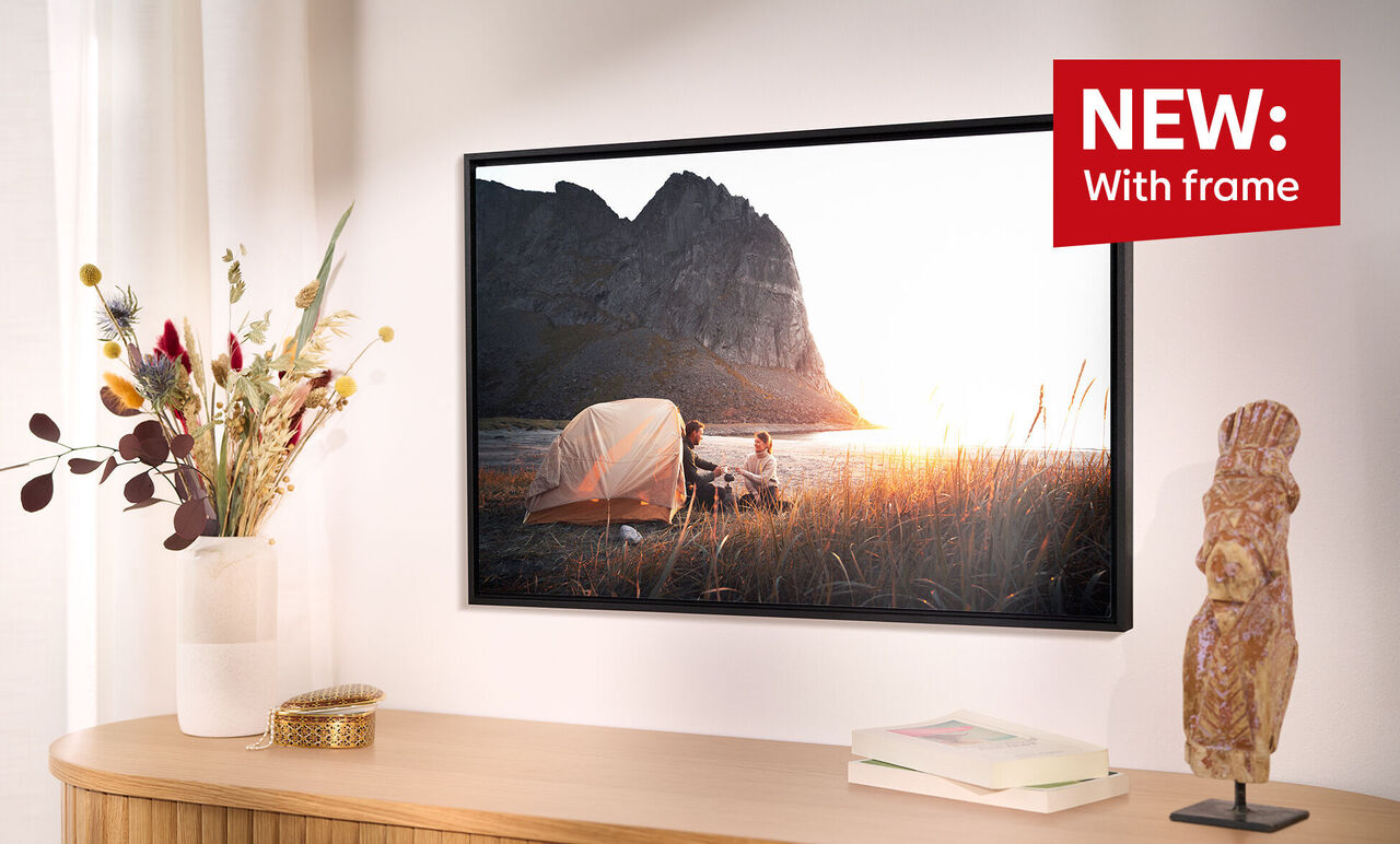 Wall mural with camping scene at sunset, tent and family.
