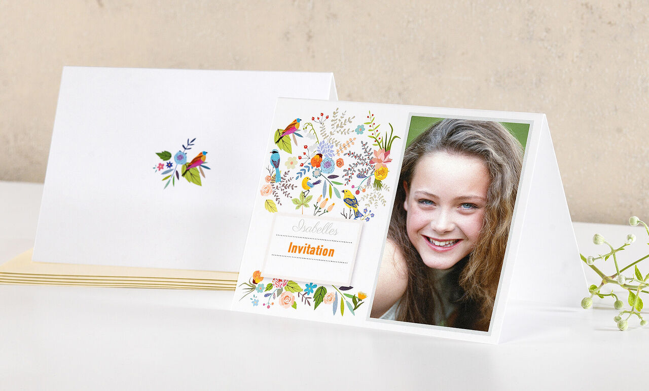 Invitation card with a colorful flower pattern and space for a photo. The card says 'Invitation'.