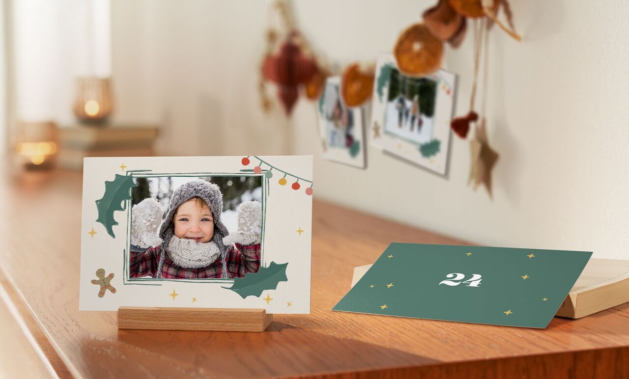 Beautifully decorated festive greeting card on a wooden table.