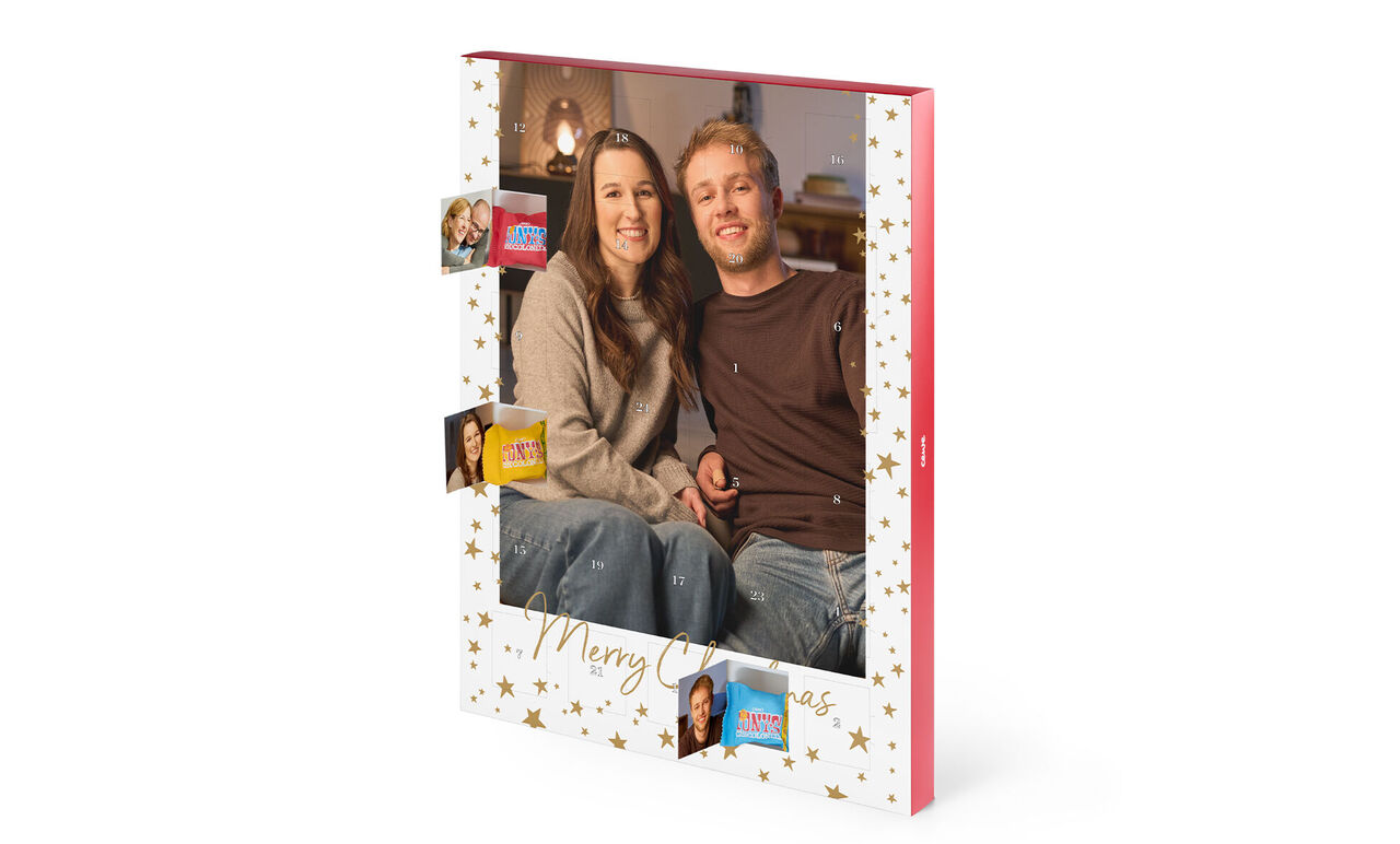 A Christmas photo of a happy group in a festive frame.