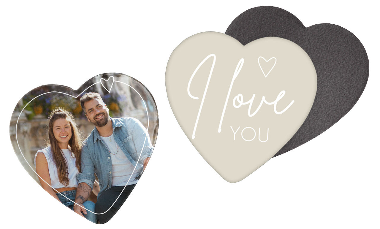 Heart-shaped greeting card with text 'I love you', expressing love and affection.