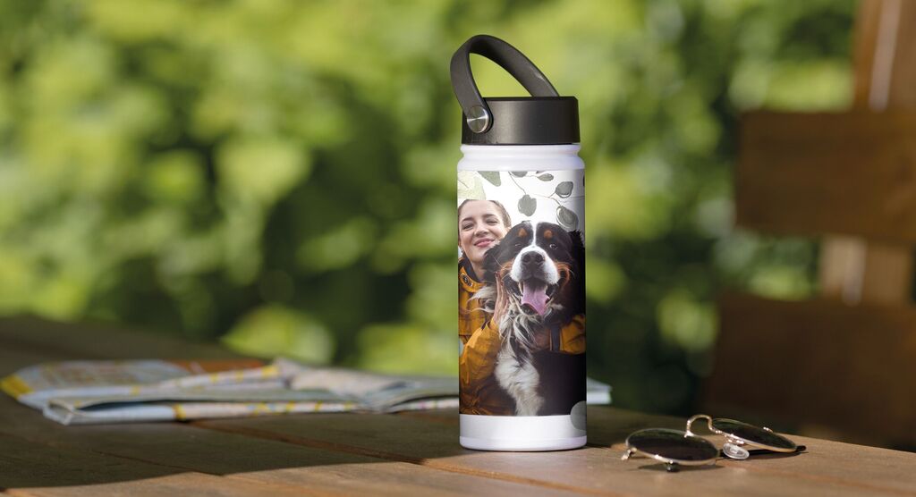 A beautiful water bottle with a vibrant photo of a dog on the front