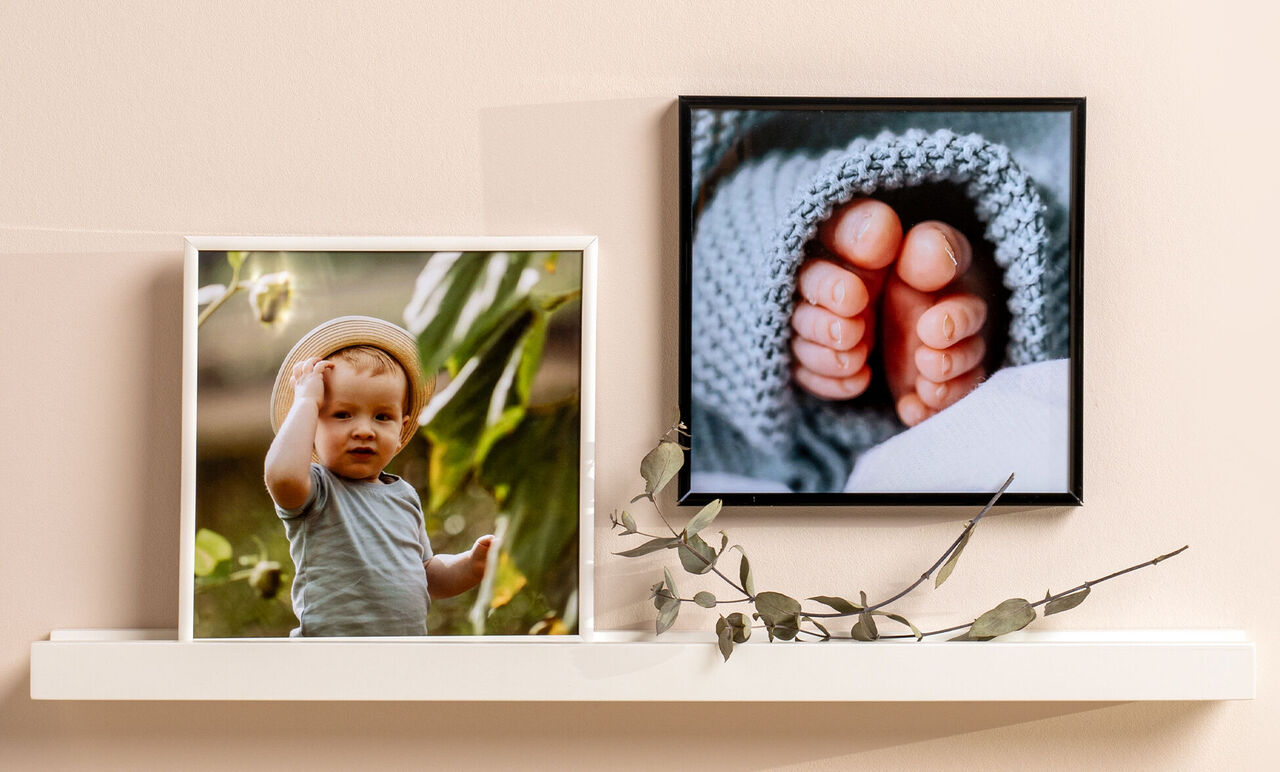 A child outdoors pointing with their hand. Next to them is a picture of naked baby feet in a blanket.