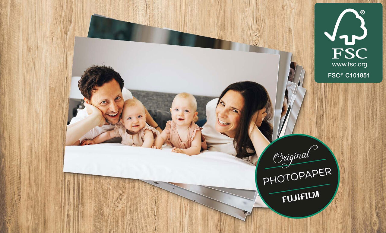Family enjoying time together with their photos on a table