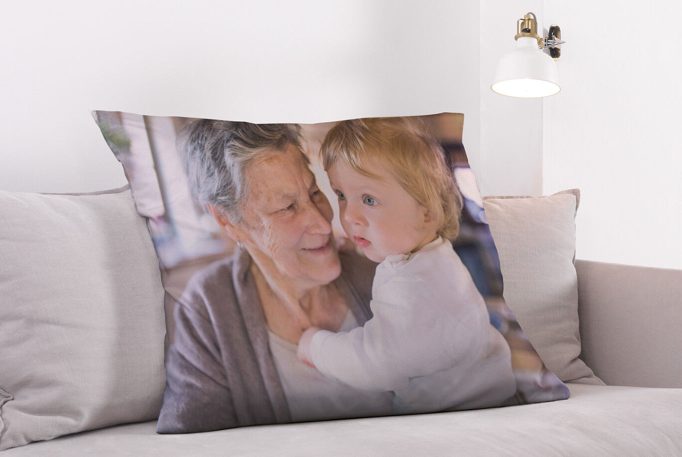 Pillow featuring a loving memory photo of a person with a child on a couch