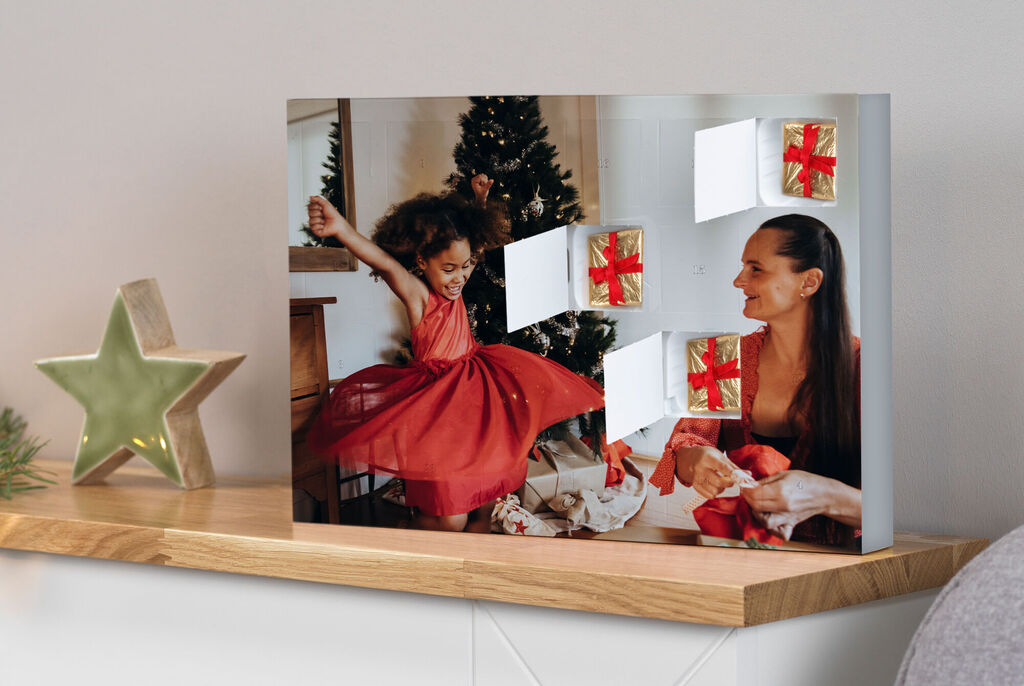 Joyful holiday moments with gifts and a Christmas tree.