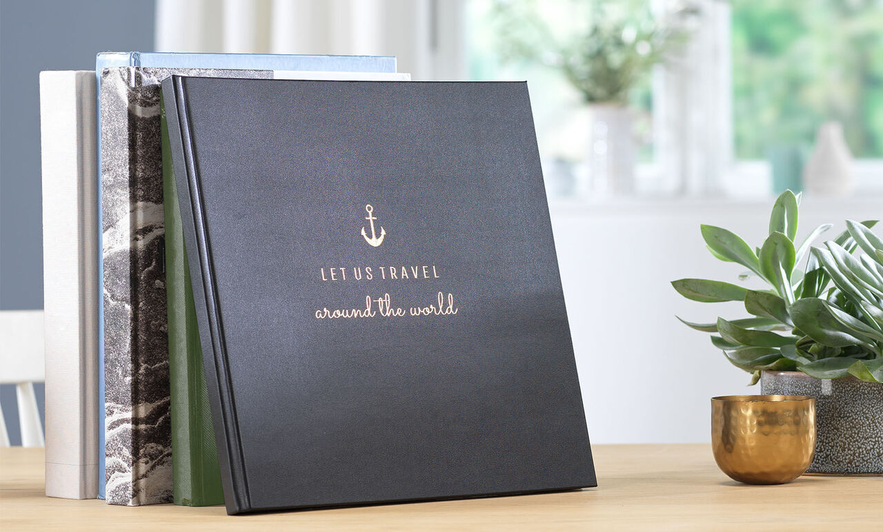 Various photo books on a table, individually designed
