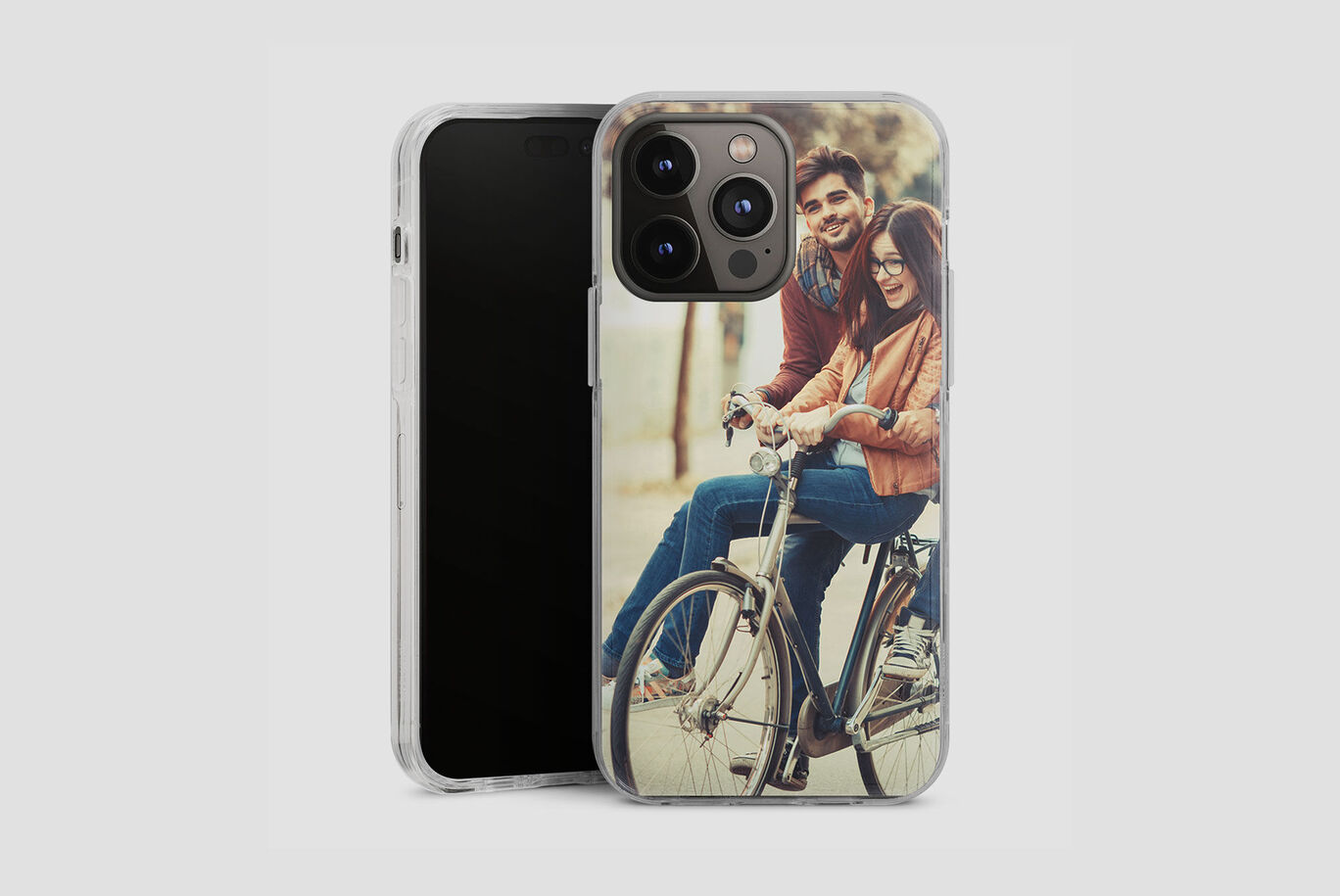 A stylish phone case with an image of a couple on bicycles having fun together.