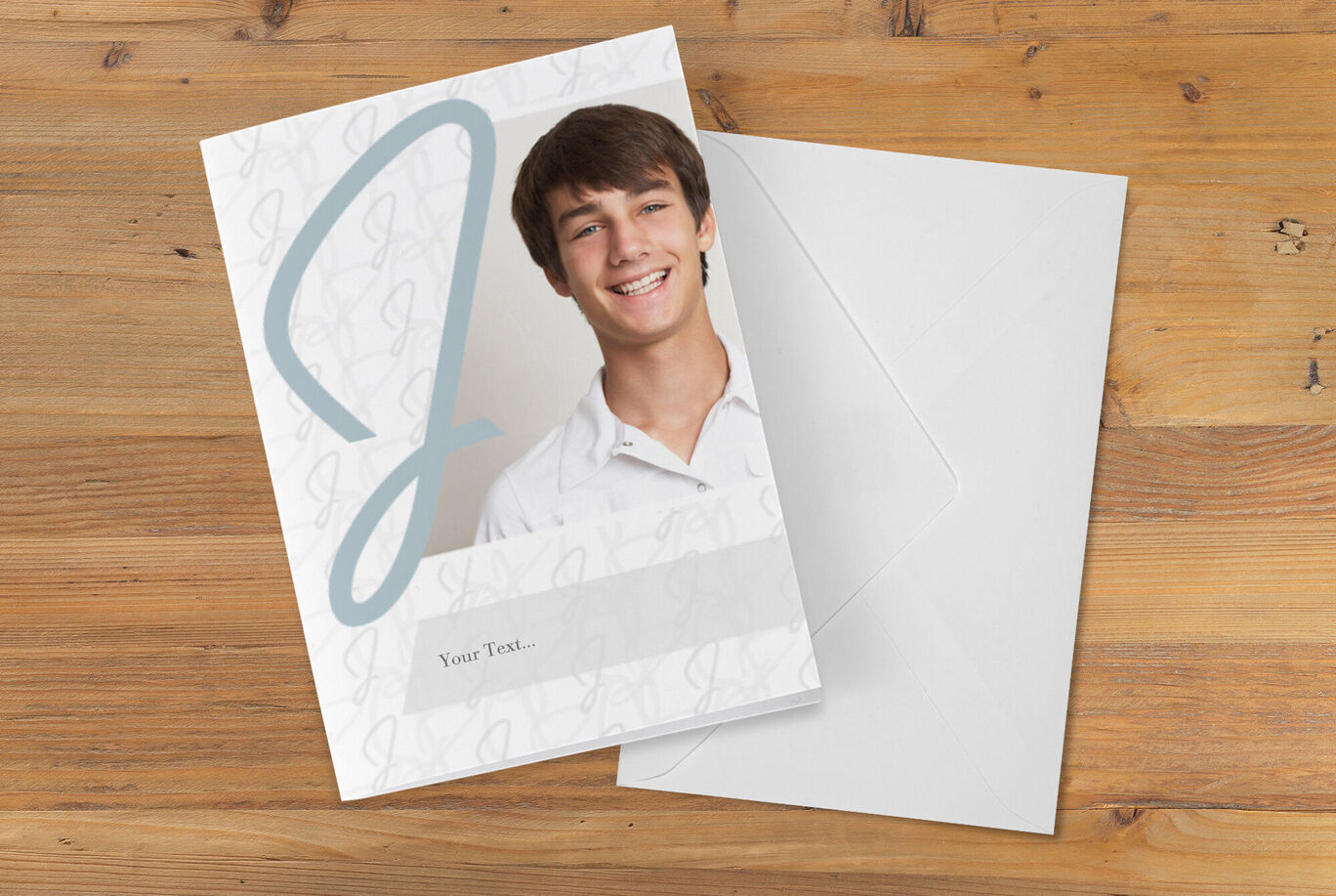Personalized card design with an initial letter of the CEWE brand