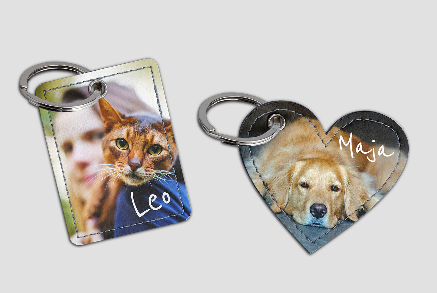 Two personalized keychains with animal motifs