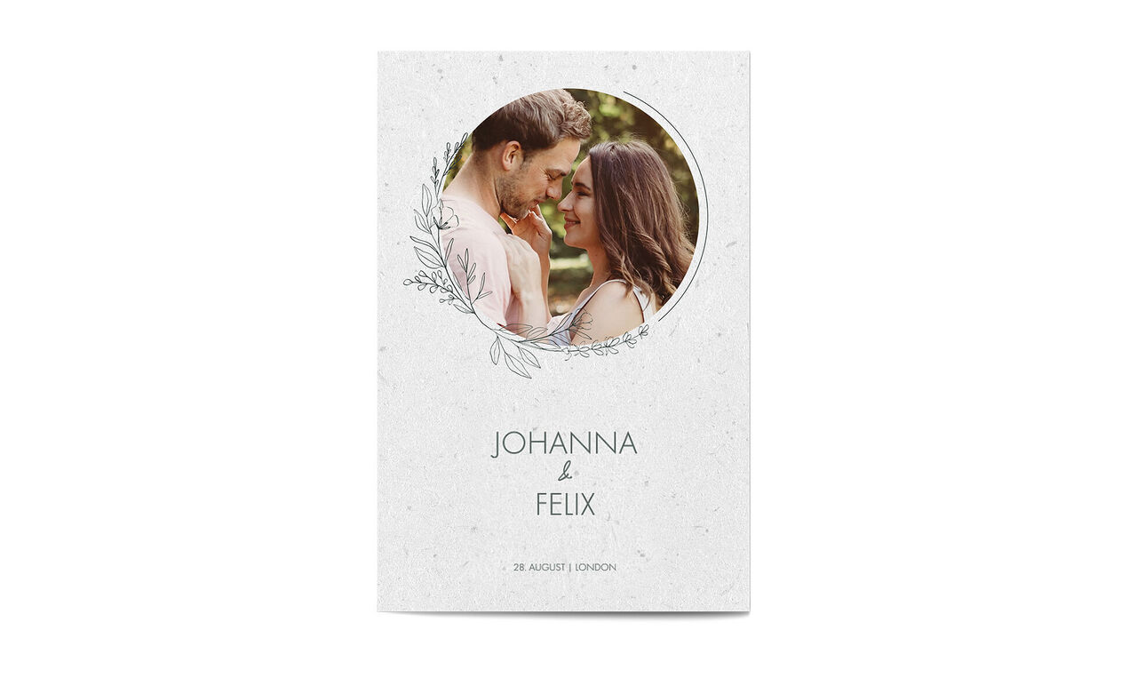 A creative design for a personal wedding invitation with floral frame and stylish lettering.