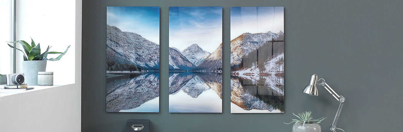 Wall picture of a winter landscape, three parts show mountains and a lake