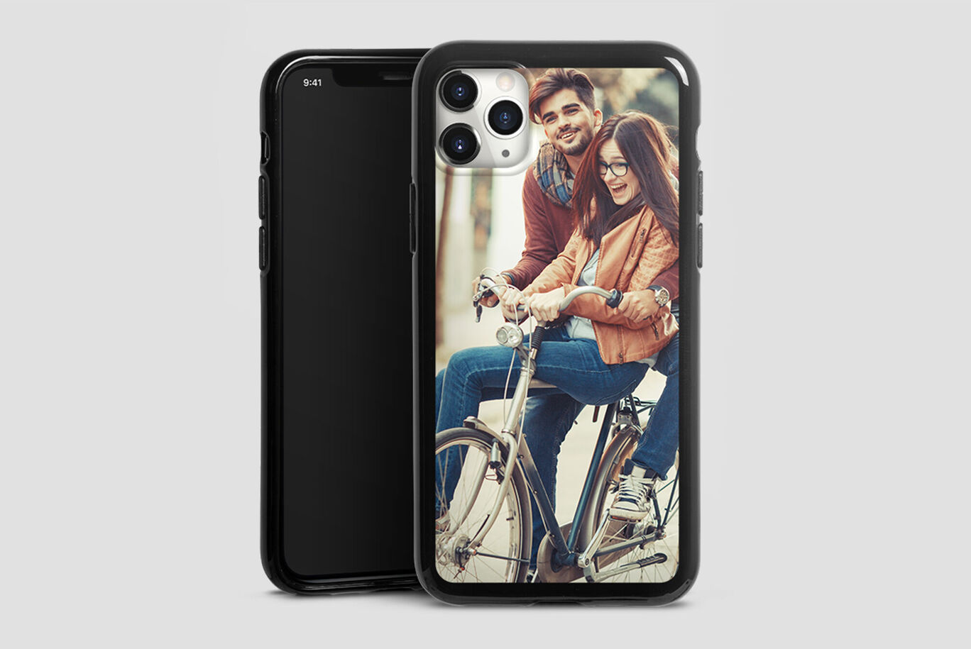 Two people on a bike, smiling in a loving embrace, sharing joy in the moment.