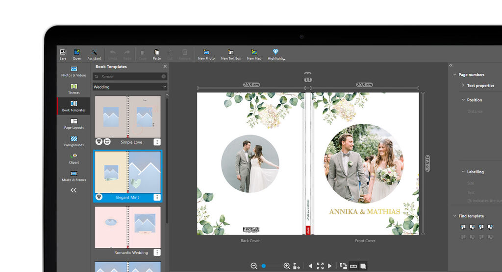Two wedding photos in a CEWE PHOTO BOOK with floral design.