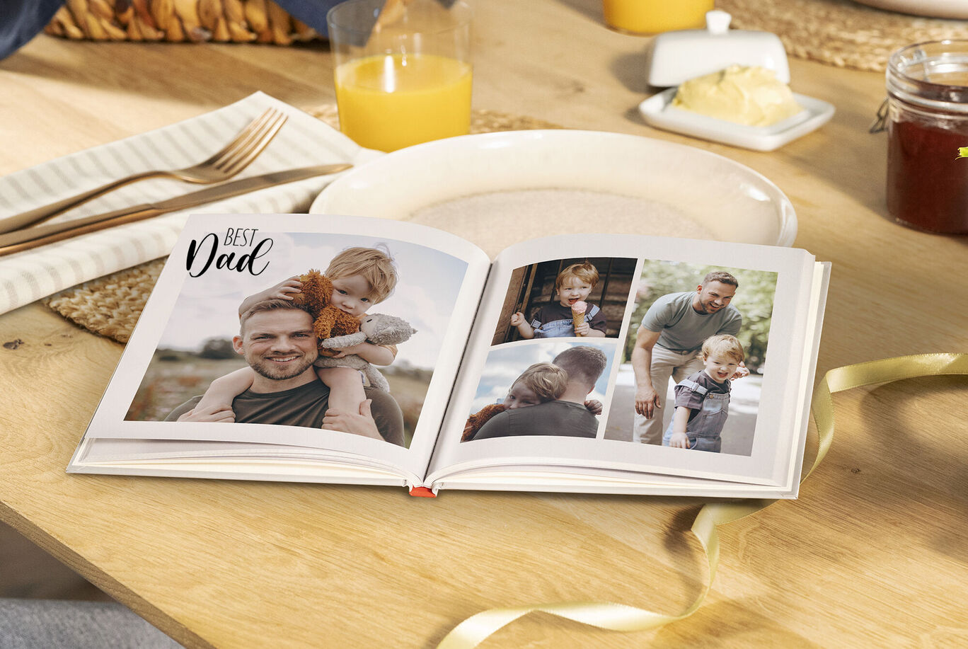 An open photo book with beautiful family moments on a table.
