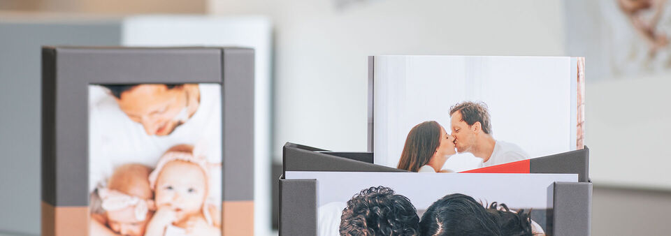 A loving arrangement of CEWE photo books showcasing personal memories