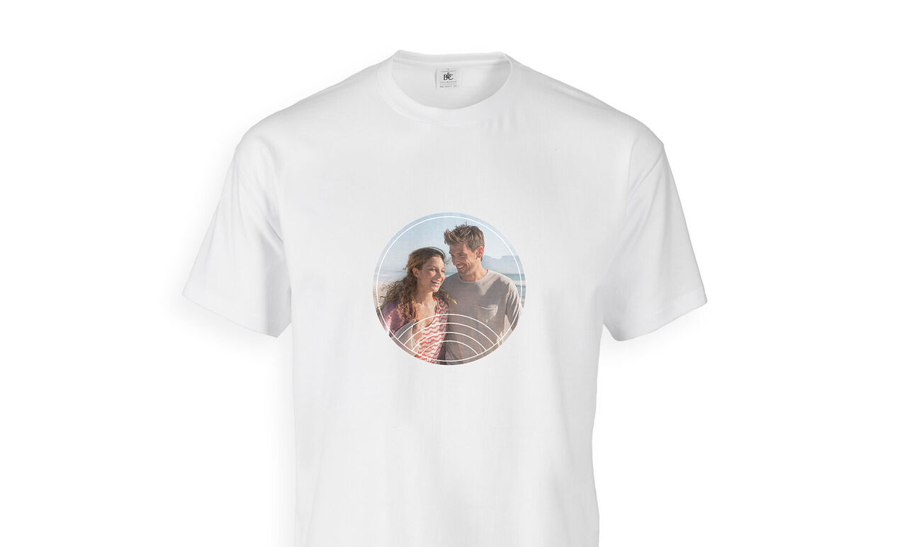 A white t-shirt with a round print showing a couple in nature