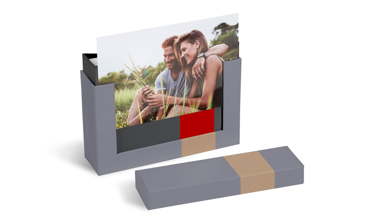 A loving photo storage with a couple outdoors.