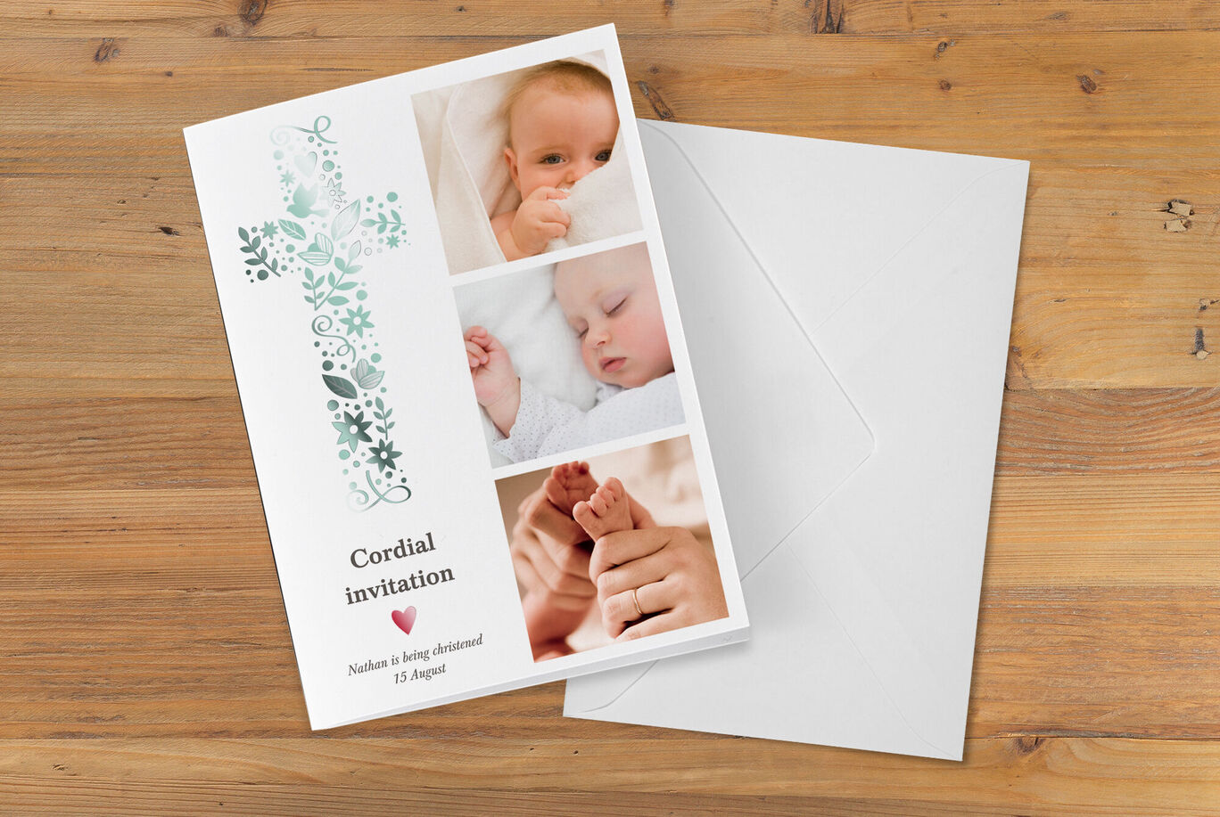 Invitation card on wooden table with sweet baby photos