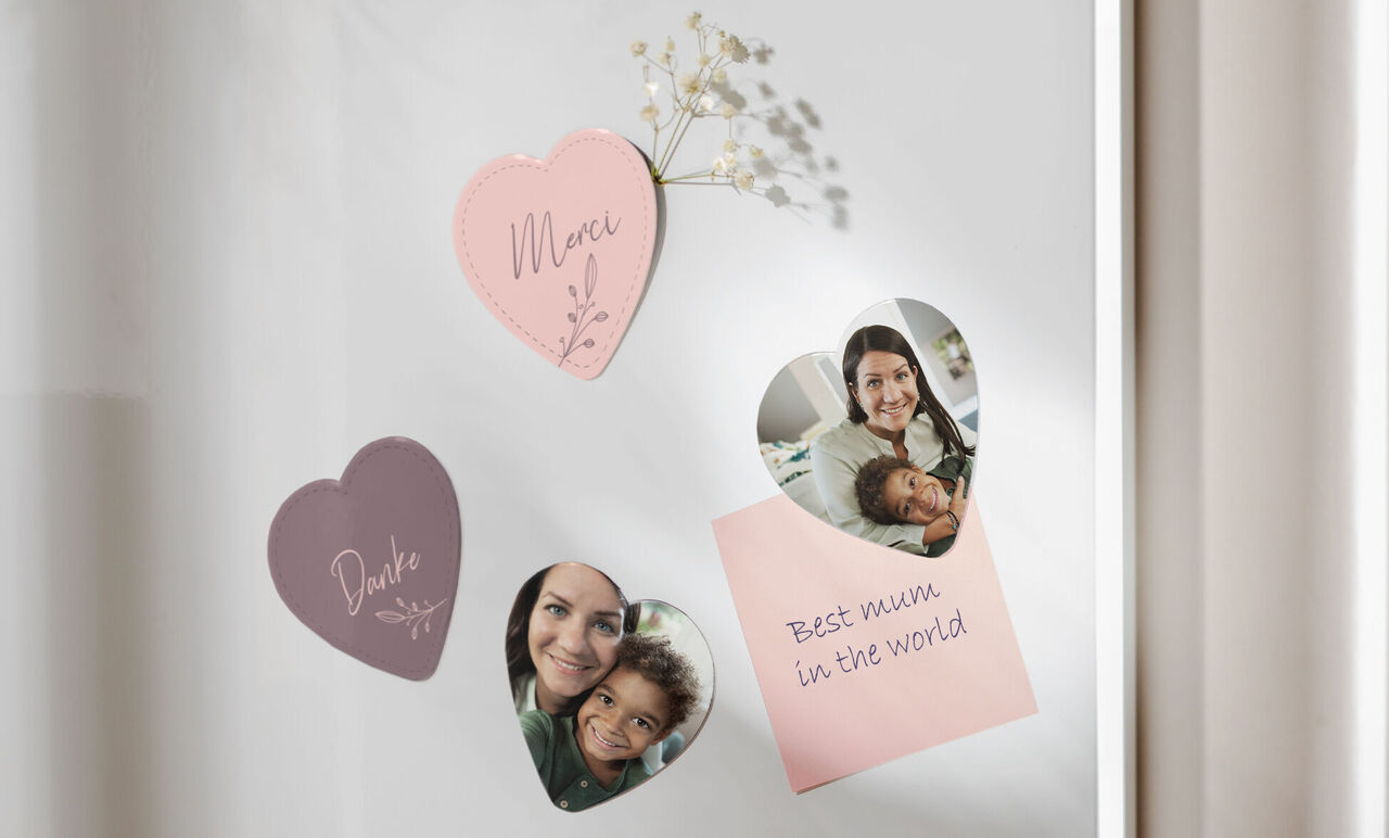 Heart shapes in various colors with loving messages like 'Mom' and 'Thank you' along with photos.