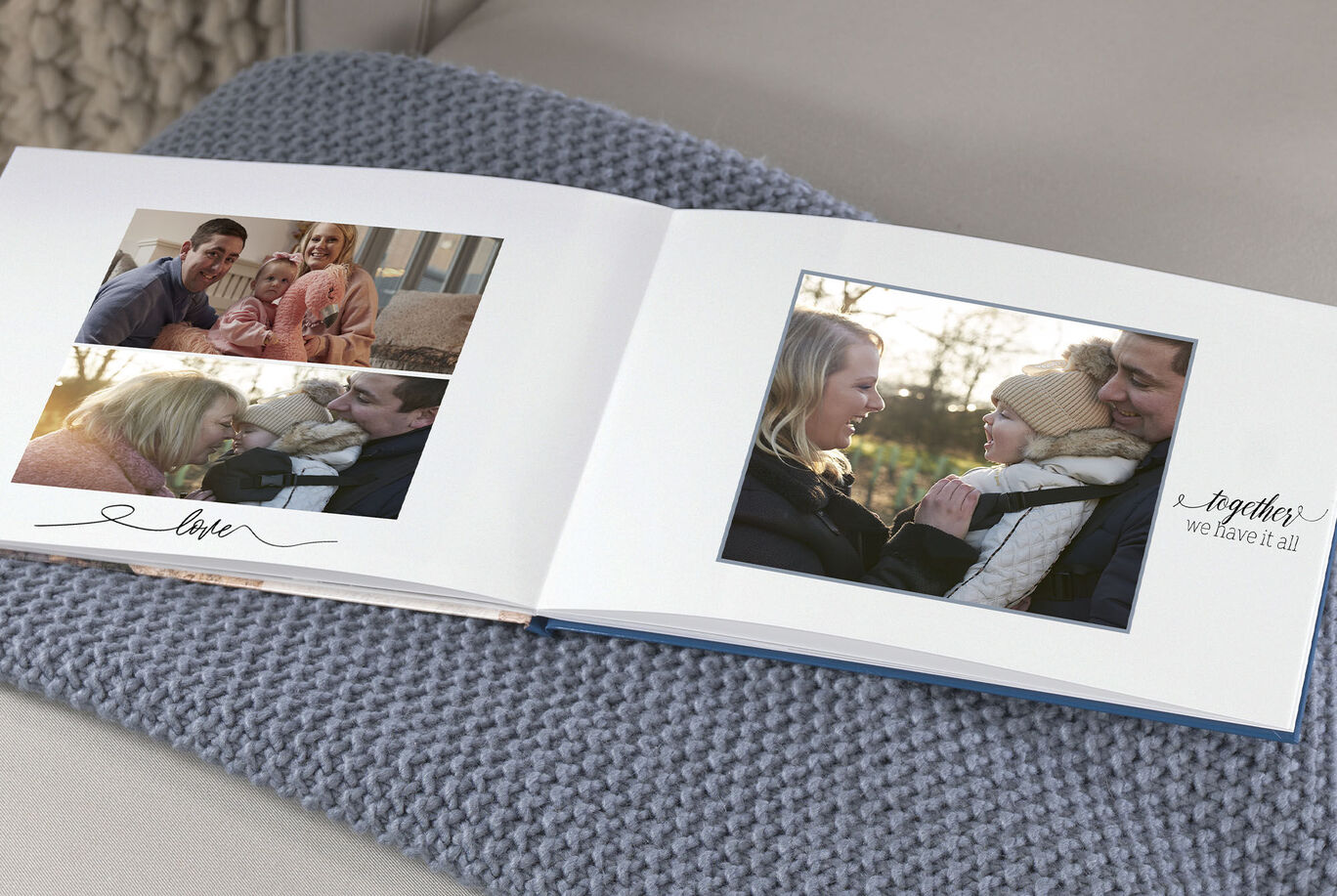 An open photo book on a cozy sofa with loving images of couples sharing intimate moments