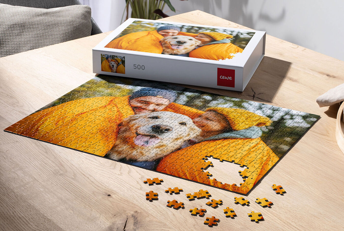 Puzzle featuring a cheerful dog and two people in yellow jackets.