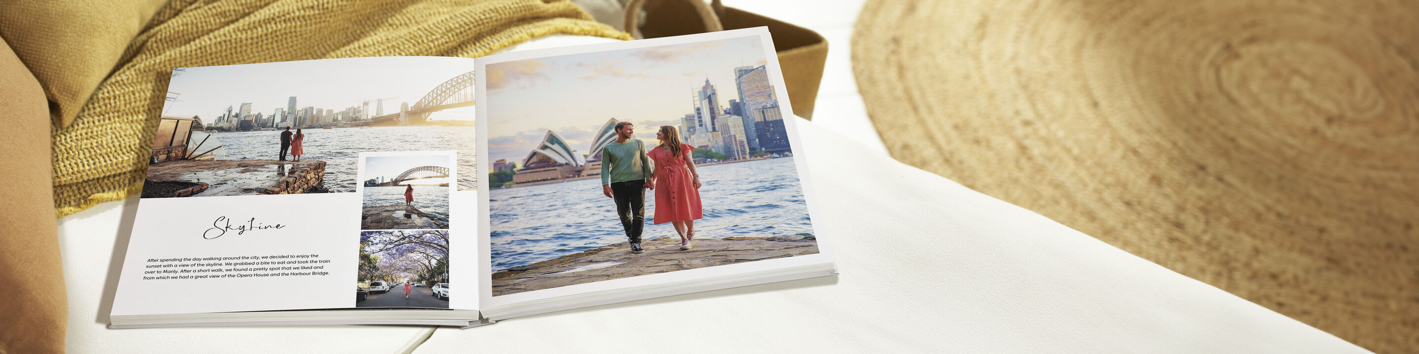 Two women walk by the water enjoying the moment, flipping through a CEWE PHOTO BOOK.
