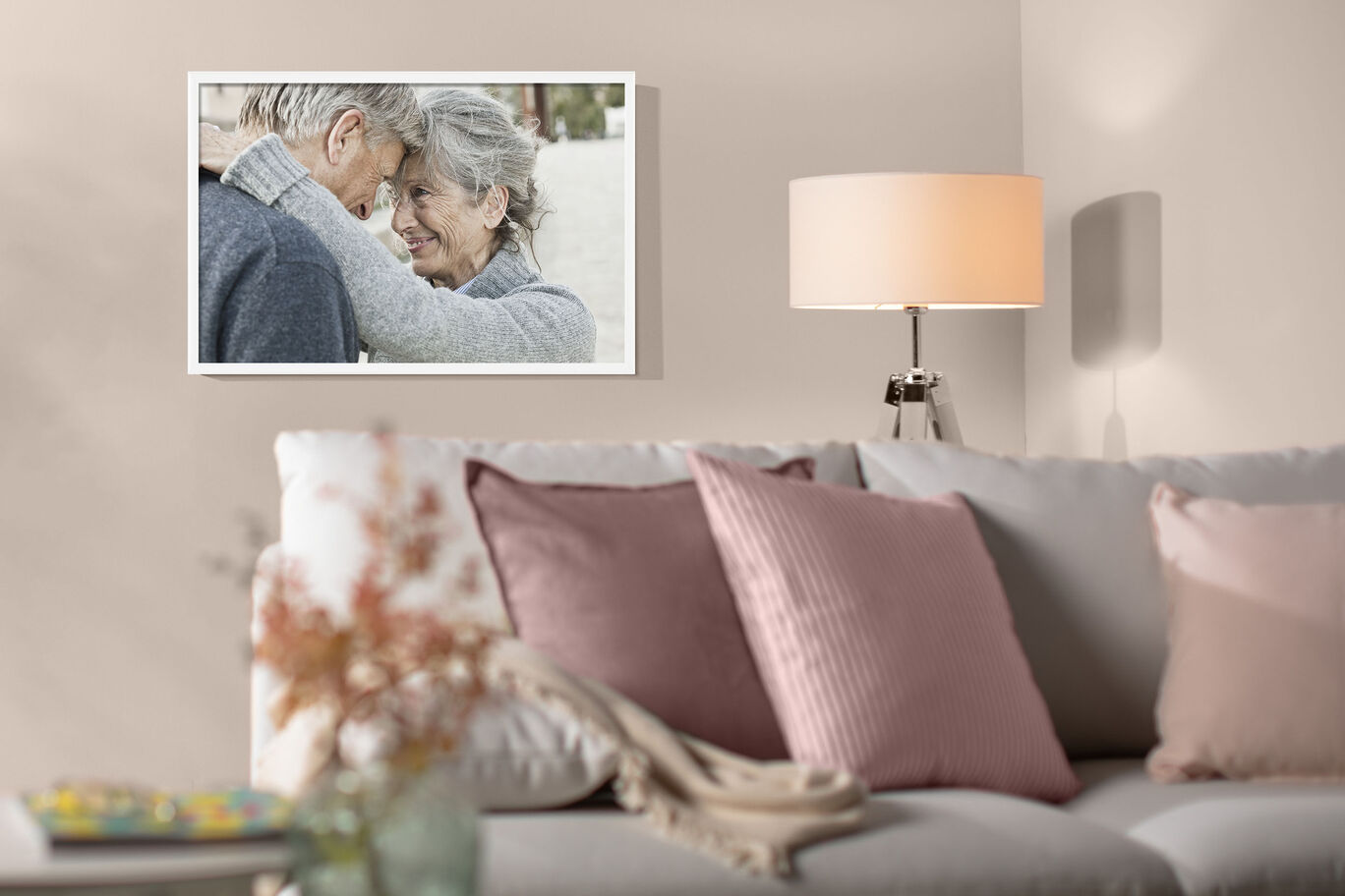 A beautiful wall art shows a couple embracing. The image conveys warmth and affection, perfect for living space.