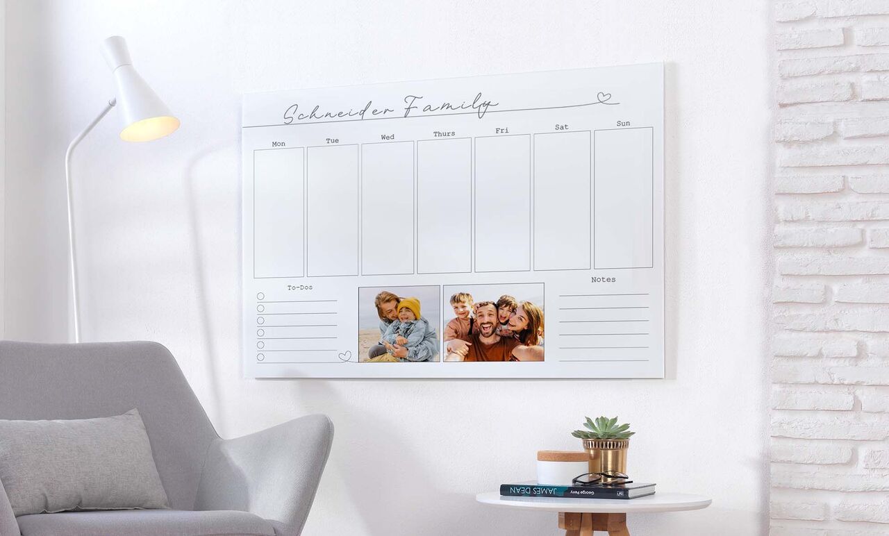 A creative photo calendar for families capturing individual memories. Features parents with their children at dinner.
