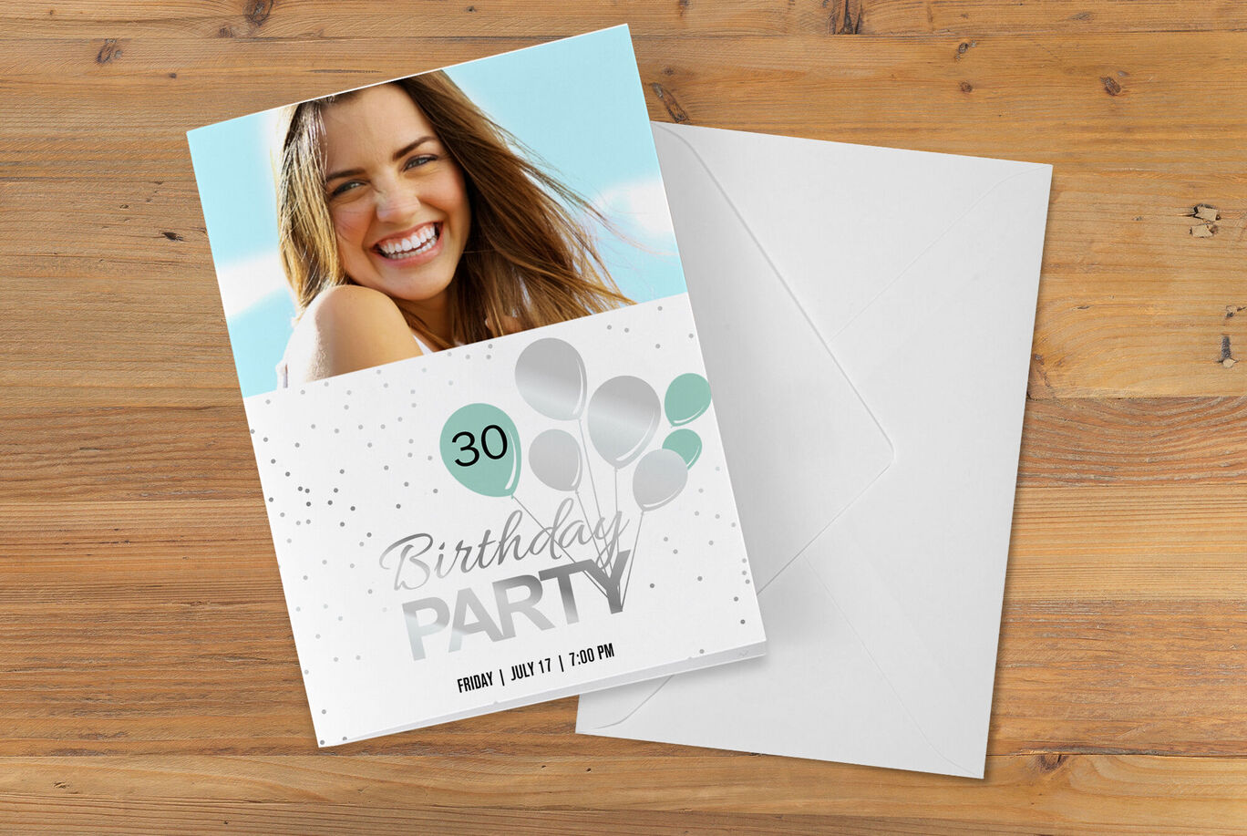 Funny birthday invitation with colorful balloons and festive design